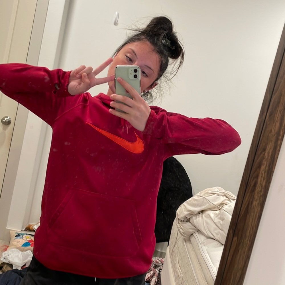 Red and orange Nike dry fit sweatshirt. Worn once, has no problems at all.